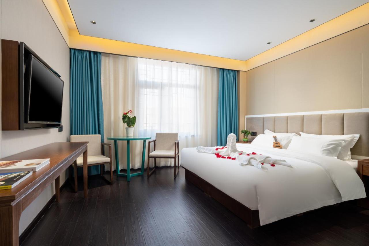 ไชนีส คัลเจอร์ ฮอลิเดย์ โฮเต็ล หนานลัวฉูเซียง Hotel ปักกิ่ง ภายนอก รูปภาพ