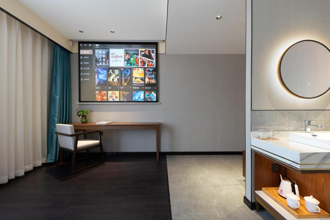 ไชนีส คัลเจอร์ ฮอลิเดย์ โฮเต็ล หนานลัวฉูเซียง Hotel ปักกิ่ง ภายนอก รูปภาพ