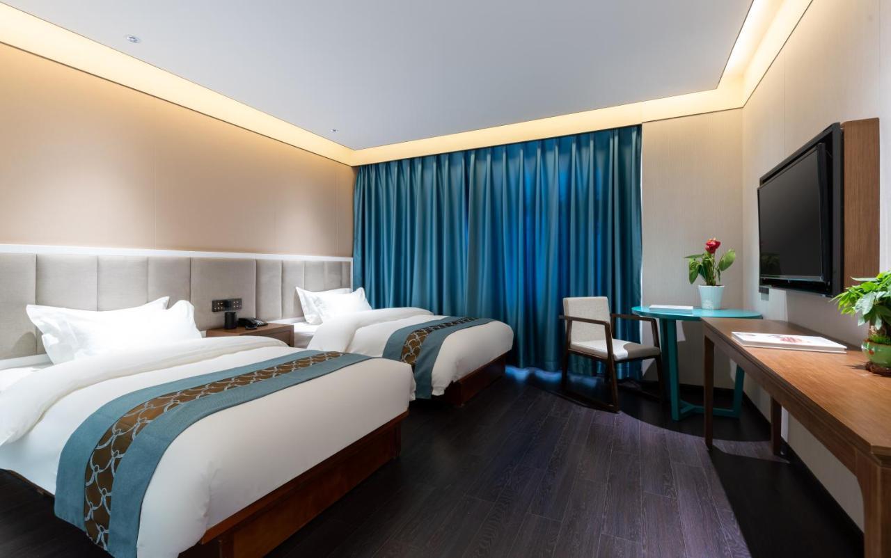 ไชนีส คัลเจอร์ ฮอลิเดย์ โฮเต็ล หนานลัวฉูเซียง Hotel ปักกิ่ง ภายนอก รูปภาพ