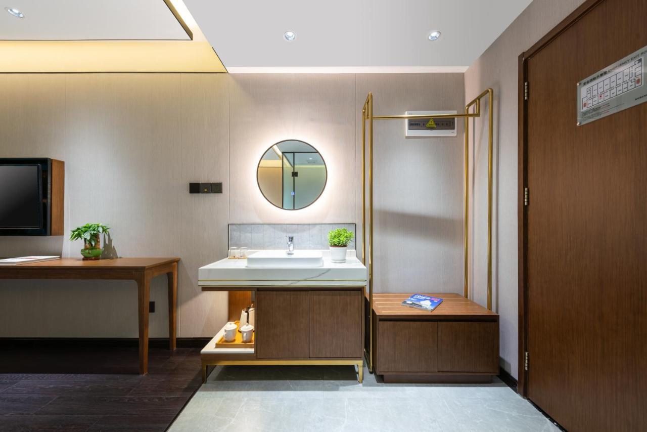 ไชนีส คัลเจอร์ ฮอลิเดย์ โฮเต็ล หนานลัวฉูเซียง Hotel ปักกิ่ง ภายนอก รูปภาพ