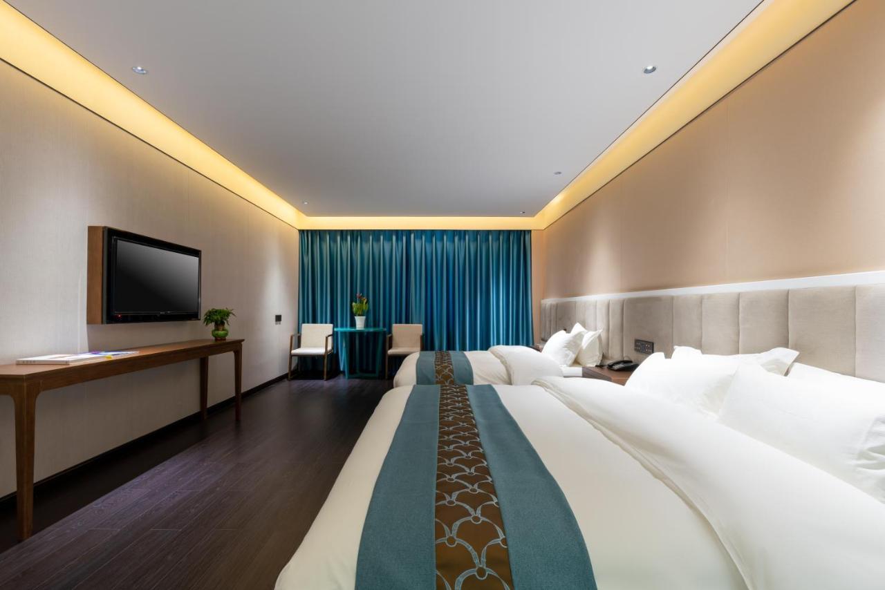 ไชนีส คัลเจอร์ ฮอลิเดย์ โฮเต็ล หนานลัวฉูเซียง Hotel ปักกิ่ง ภายนอก รูปภาพ