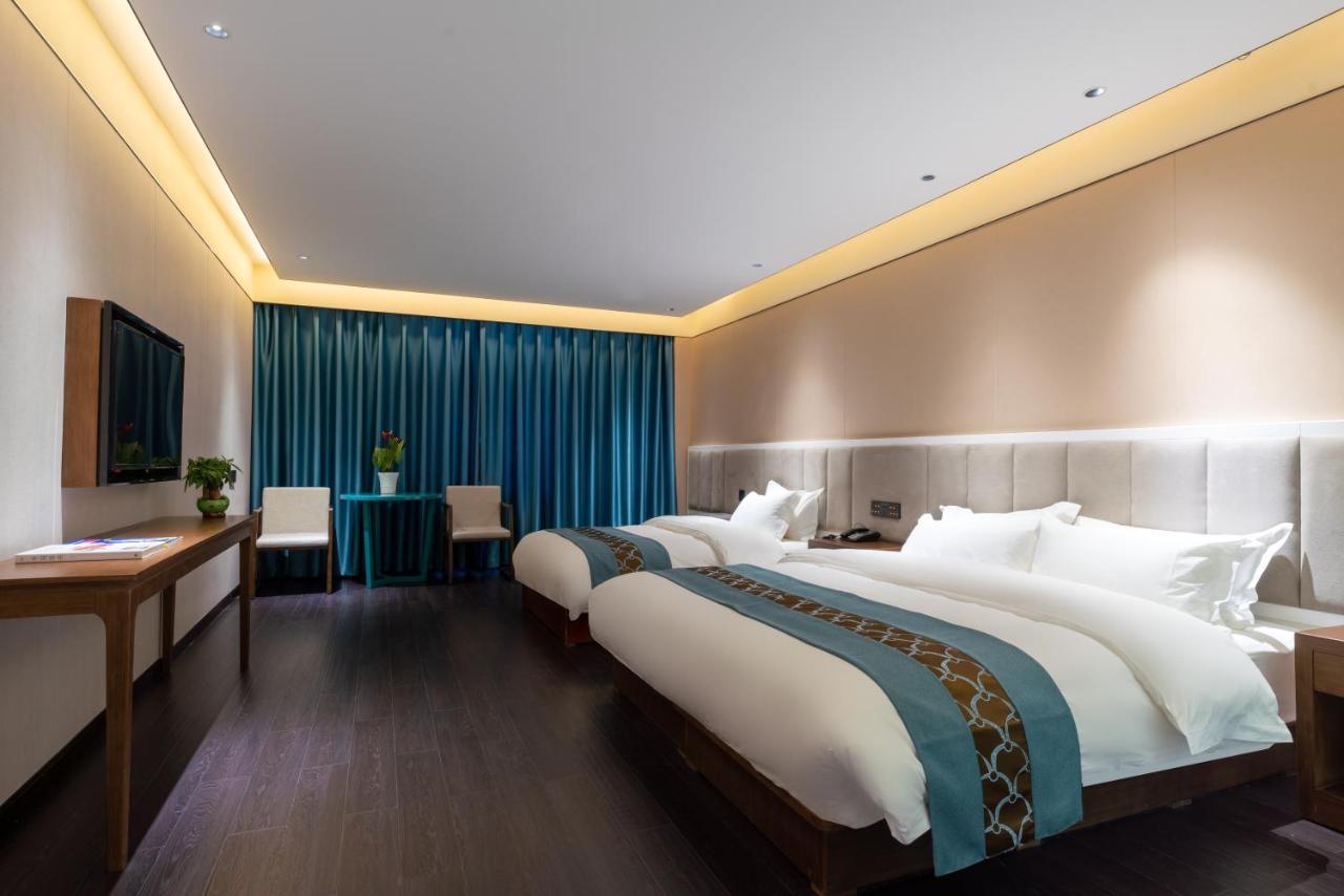 ไชนีส คัลเจอร์ ฮอลิเดย์ โฮเต็ล หนานลัวฉูเซียง Hotel ปักกิ่ง ภายนอก รูปภาพ