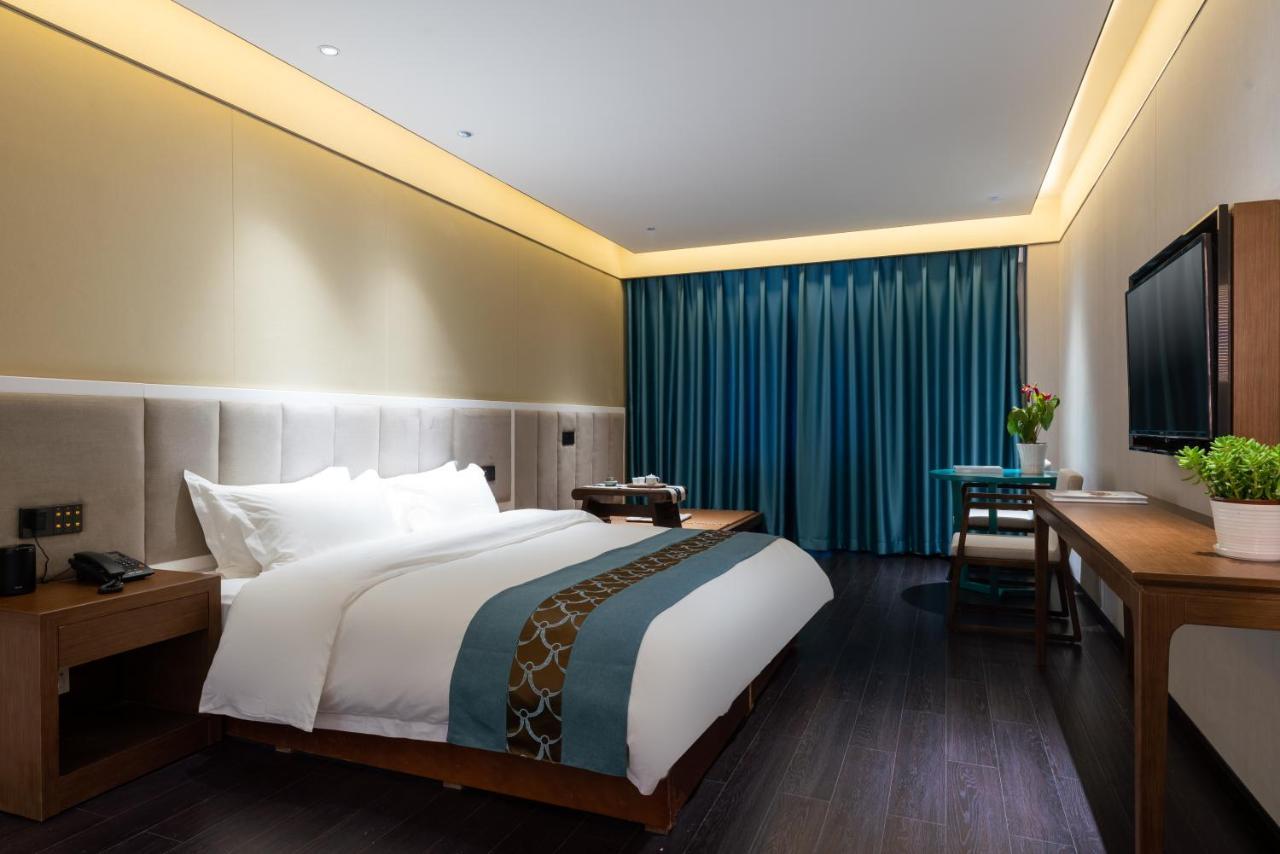 ไชนีส คัลเจอร์ ฮอลิเดย์ โฮเต็ล หนานลัวฉูเซียง Hotel ปักกิ่ง ภายนอก รูปภาพ