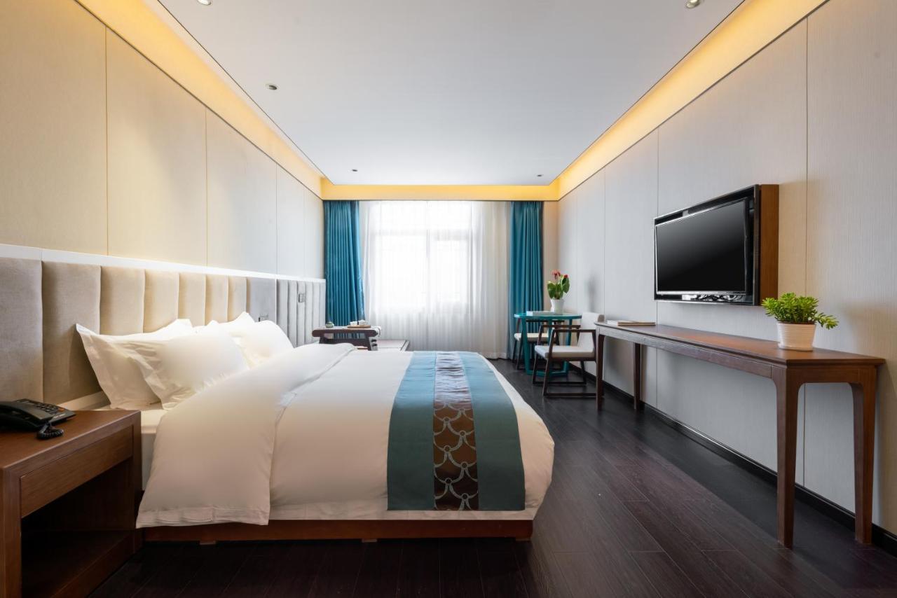 ไชนีส คัลเจอร์ ฮอลิเดย์ โฮเต็ล หนานลัวฉูเซียง Hotel ปักกิ่ง ภายนอก รูปภาพ