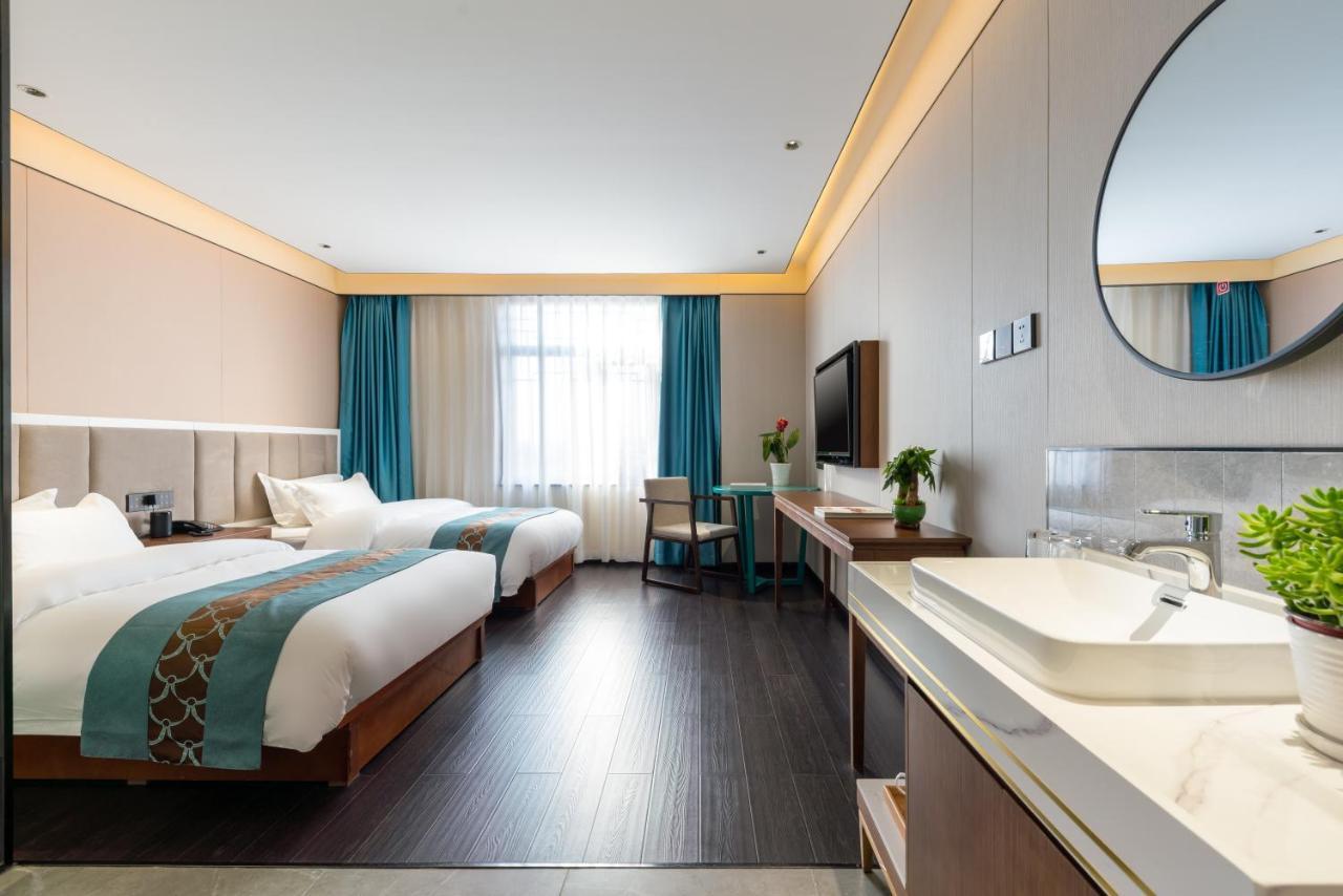 ไชนีส คัลเจอร์ ฮอลิเดย์ โฮเต็ล หนานลัวฉูเซียง Hotel ปักกิ่ง ภายนอก รูปภาพ