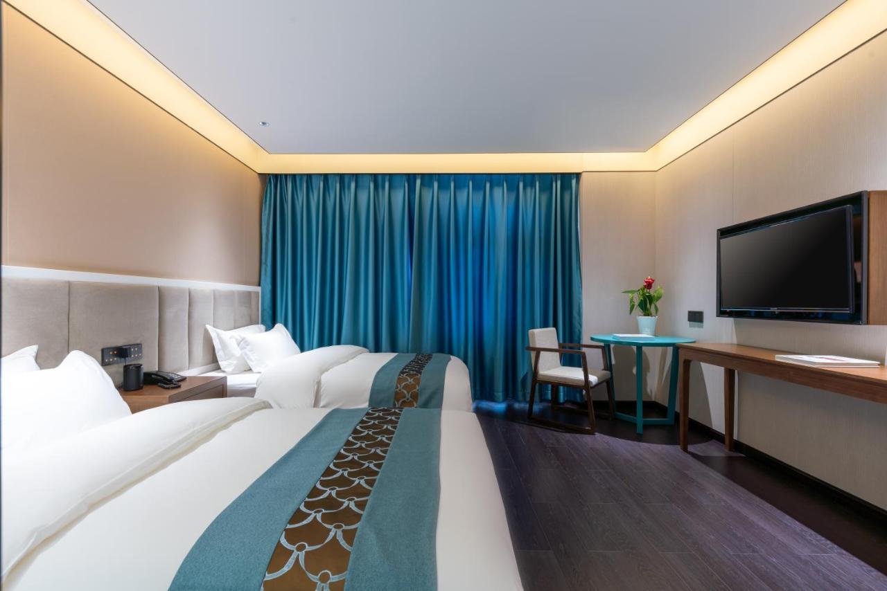 ไชนีส คัลเจอร์ ฮอลิเดย์ โฮเต็ล หนานลัวฉูเซียง Hotel ปักกิ่ง ภายนอก รูปภาพ