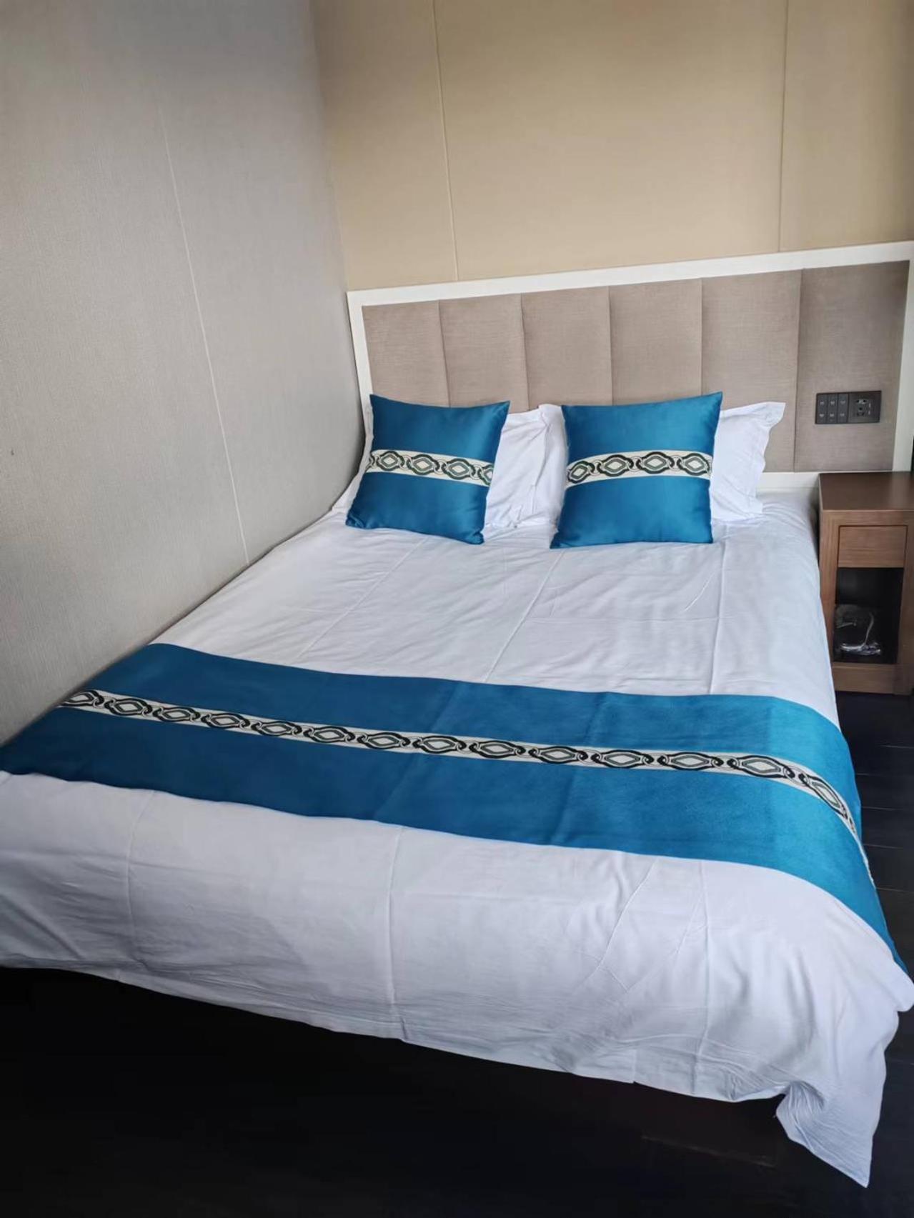 ไชนีส คัลเจอร์ ฮอลิเดย์ โฮเต็ล หนานลัวฉูเซียง Hotel ปักกิ่ง ภายนอก รูปภาพ