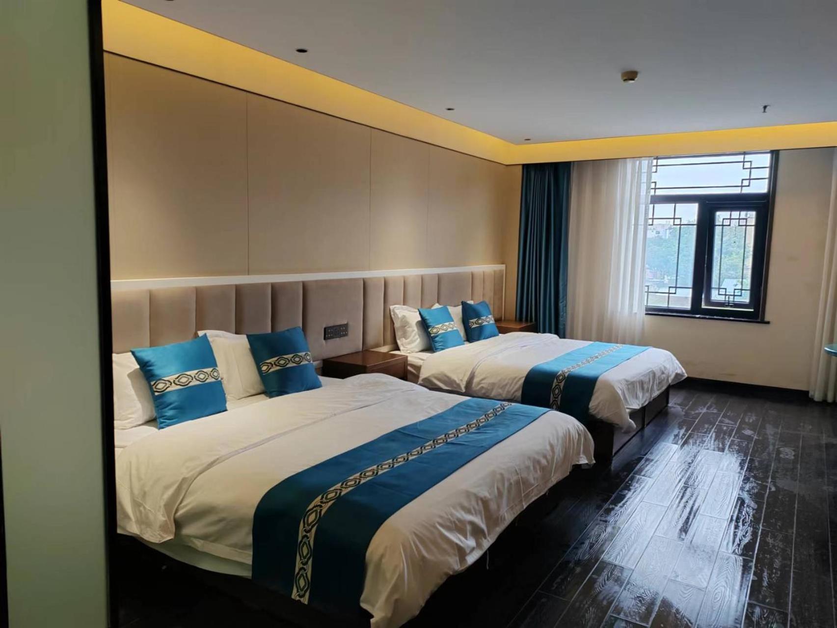 ไชนีส คัลเจอร์ ฮอลิเดย์ โฮเต็ล หนานลัวฉูเซียง Hotel ปักกิ่ง ภายนอก รูปภาพ