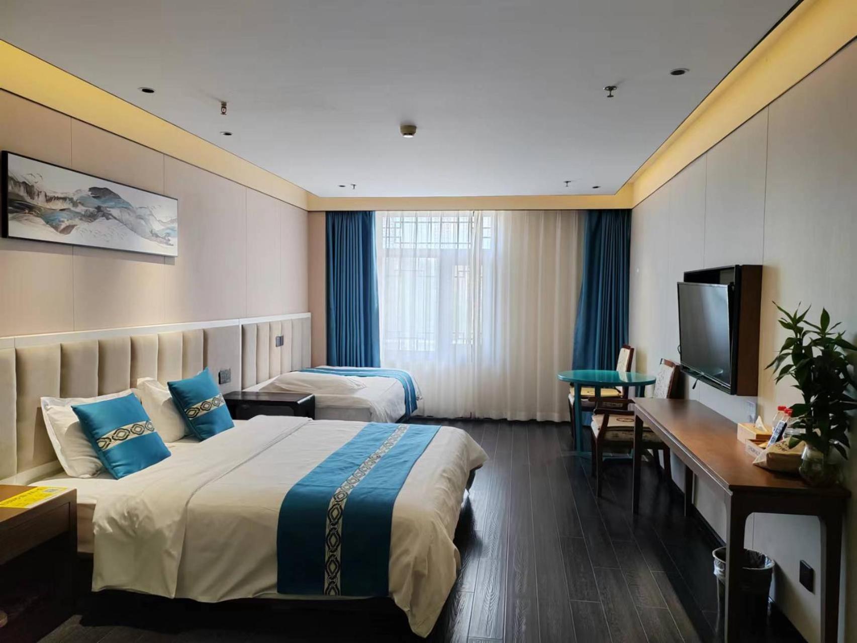 ไชนีส คัลเจอร์ ฮอลิเดย์ โฮเต็ล หนานลัวฉูเซียง Hotel ปักกิ่ง ภายนอก รูปภาพ