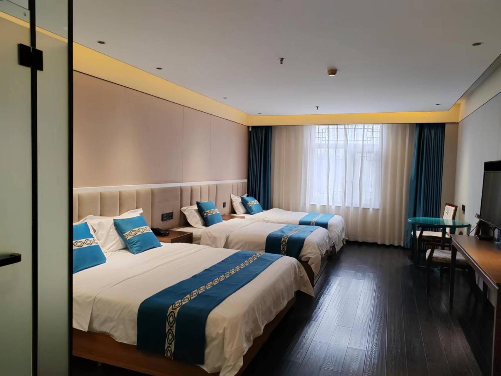 ไชนีส คัลเจอร์ ฮอลิเดย์ โฮเต็ล หนานลัวฉูเซียง Hotel ปักกิ่ง ภายนอก รูปภาพ