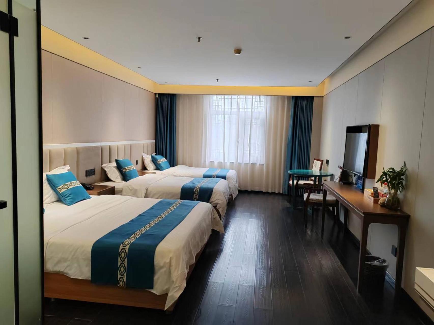 ไชนีส คัลเจอร์ ฮอลิเดย์ โฮเต็ล หนานลัวฉูเซียง Hotel ปักกิ่ง ภายนอก รูปภาพ